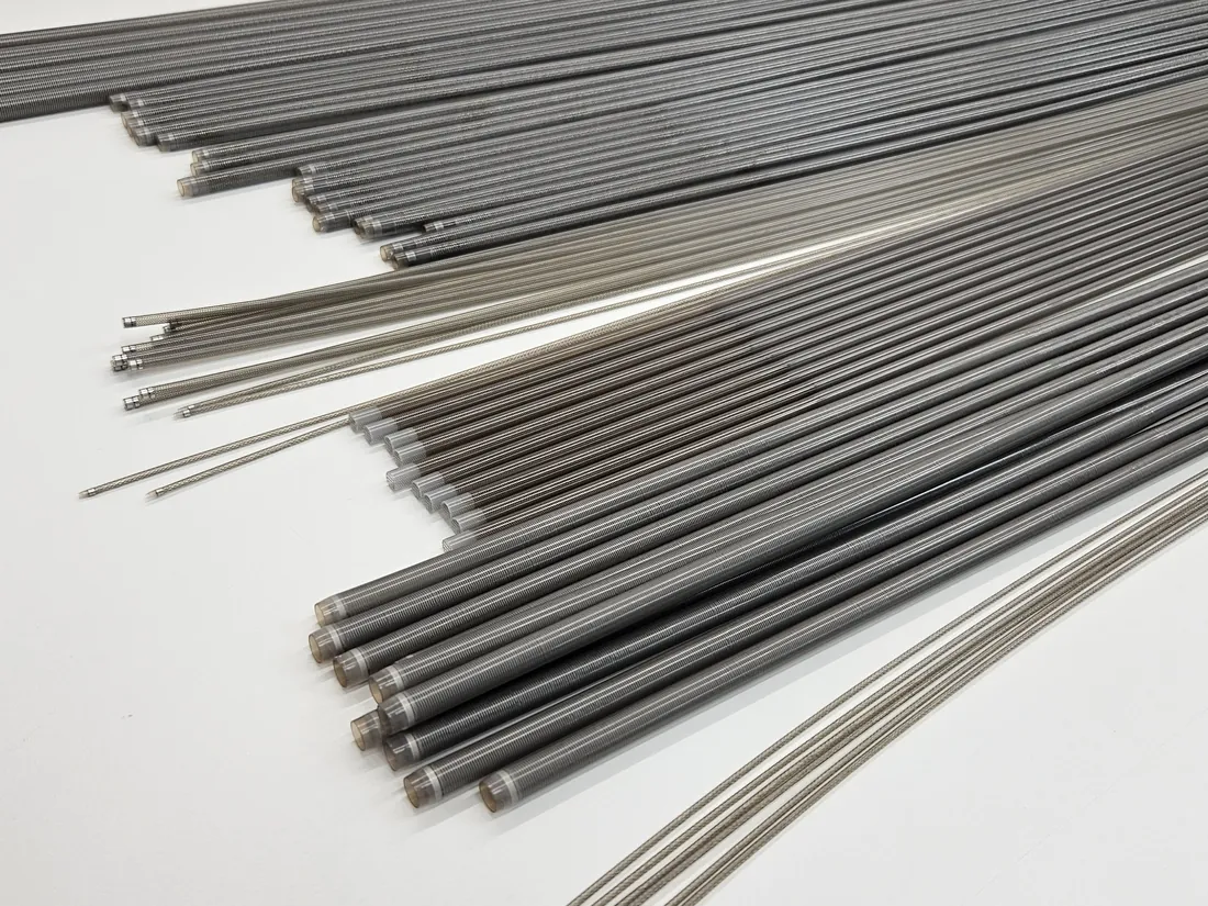Reinforced tubing and multi-layer catheter components manufactured by Heftman R&D